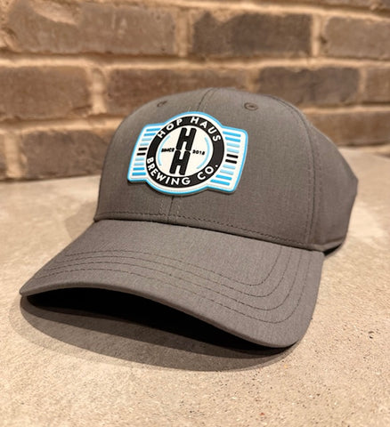Grey hat with plastic patch